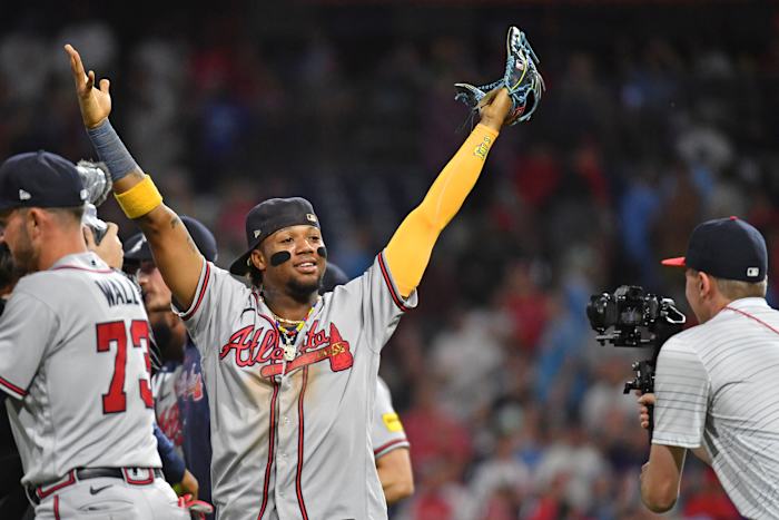 Sep 13, 2023; Philadelphia, Pennsylvania, USA; Atlanta Braves right fielder Ronald Acuna Jr. (13) celebrates their 6th straight National League East title with win against the Philadelphia Phillies at Citizens Bank Park.